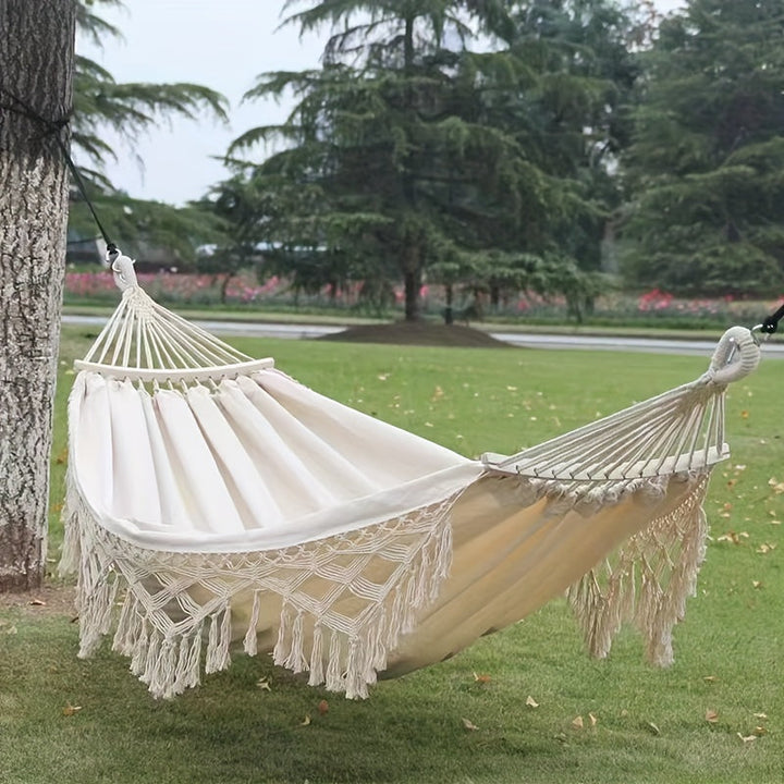 Hamac Boho Lunaria Breeze | Avec pompons et rayures | Coton | Pour 2 personnes | Capacité de 43 à 54 kg