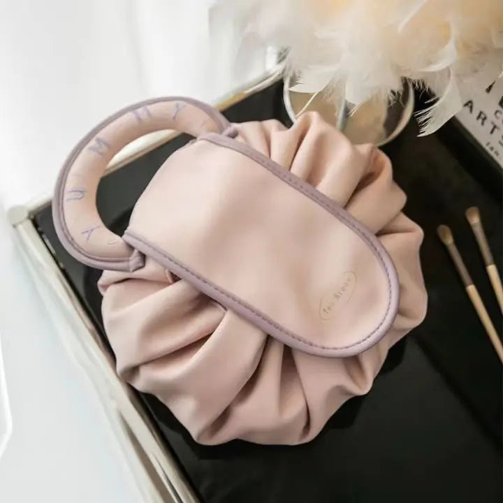 ChicNest – Le sac à maquillage qui s'étale pour vous !