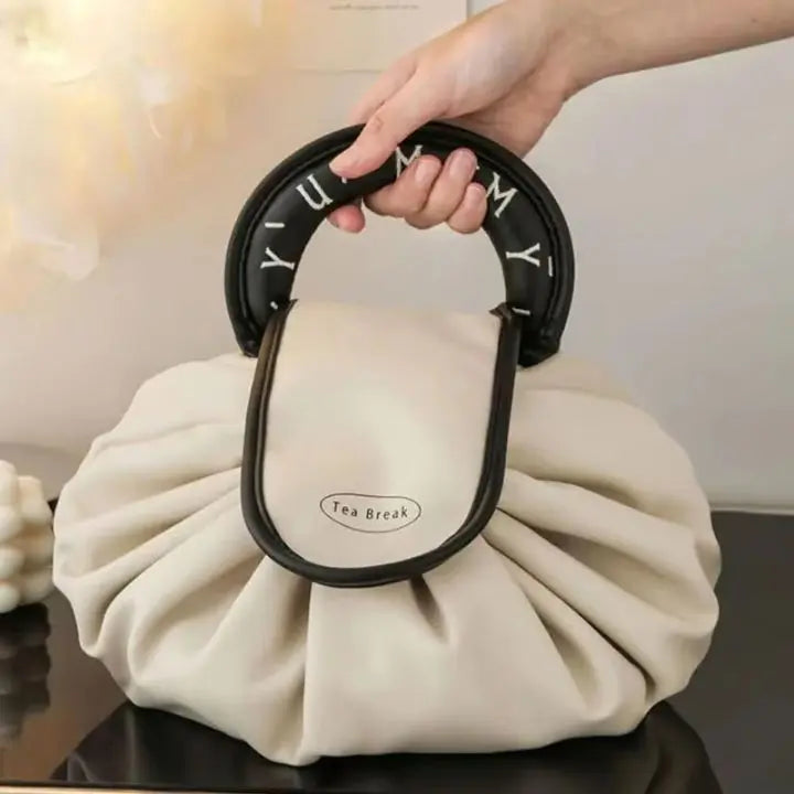 ChicNest – Le sac à maquillage qui s'étale pour vous !