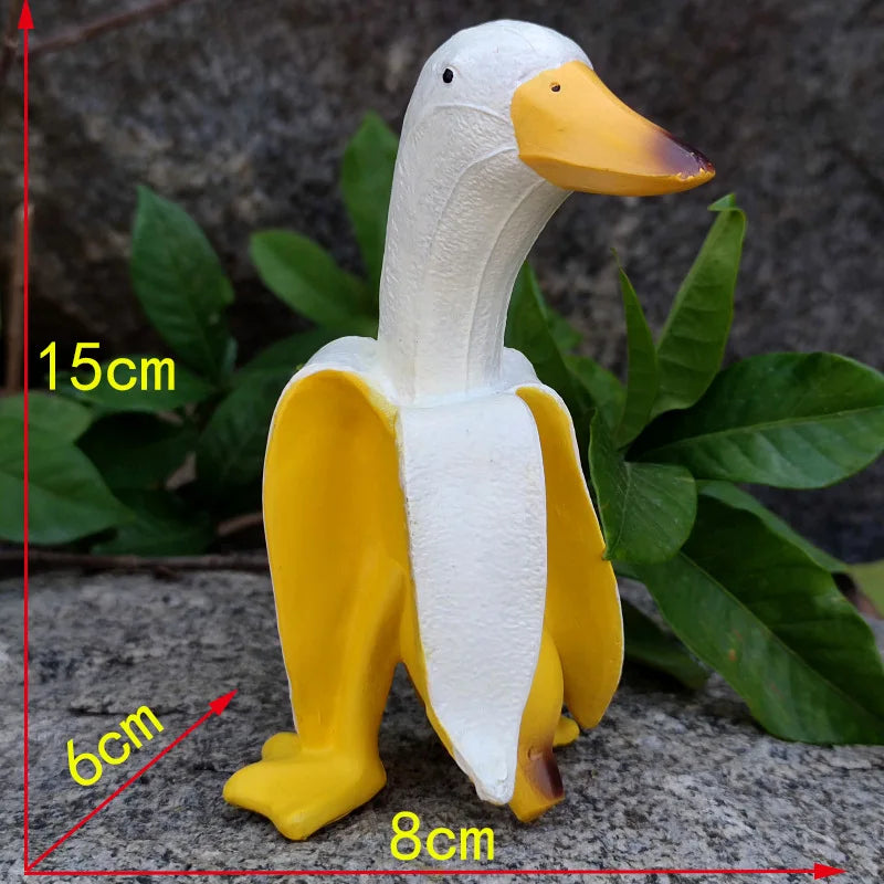 Sculpture BananaDuck "Quaki" | Décoration de jardin amusante | Résine artistique résistante aux intempéries | 17 cm