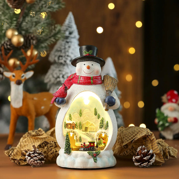 Musik-Weihnachtshaus FrostCabin | Figurine de Noël LED avec musique & train tournant | Fonctionne sur USB & piles | Maison décorative en résine
