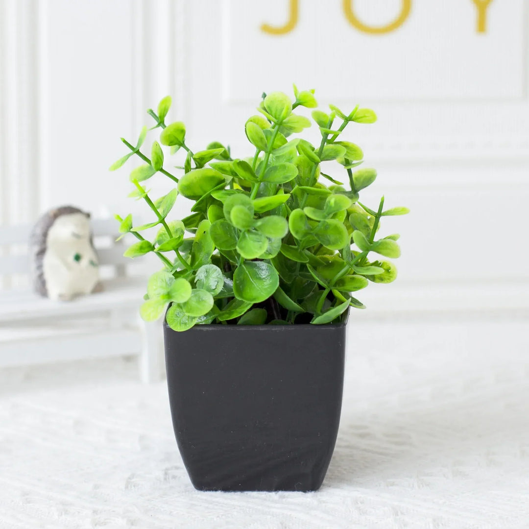 Plante artificielle d'eucalyptus Leafora dans un pot noir | Mini plante décorative | Pour table, salle de bain & bureau