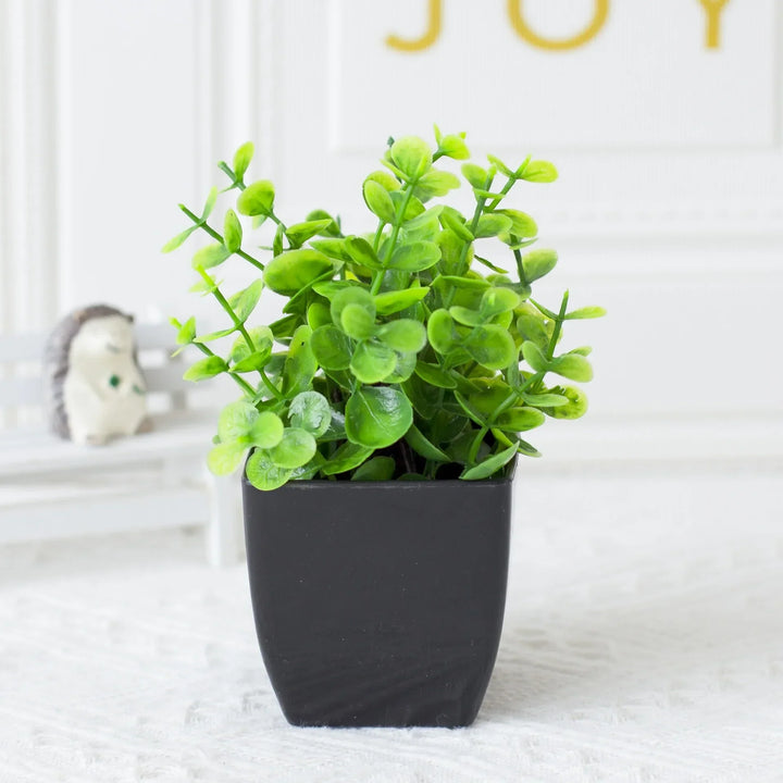 Plante artificielle d'eucalyptus Leafora dans un pot noir | Mini plante décorative | Pour table, salle de bain & bureau