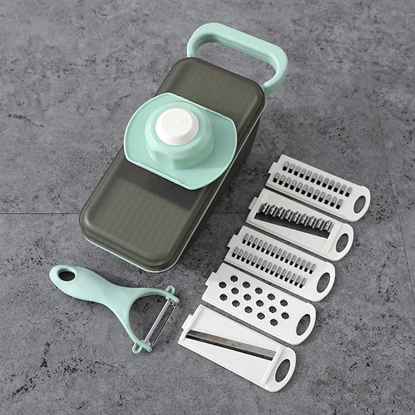 SchnippelMeister Coupe-légumes 5-en-1 | Multicoupe avec récipient de collecte | Râpe, mandoline & coupe en dés | Sans BPA & compatible lave-vaisselle | 27×11×10 cm