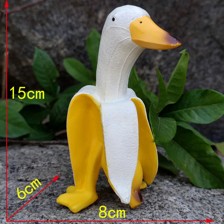 Sculpture BananaDuck "Quaki" | Décoration de jardin amusante | Résine artistique résistante aux intempéries | 17 cm