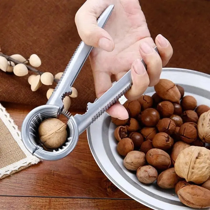 Nutoro Casse-noix en métal | Multifonctionnel pour noix, châtaignes, amandes et noisettes | Poignée ergonomique | Argent