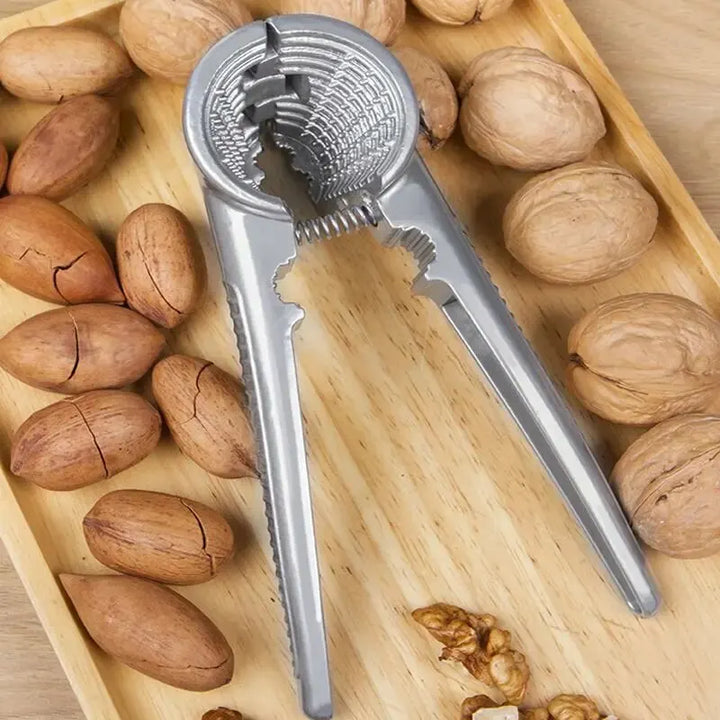 Nutoro Casse-noix en métal | Multifonctionnel pour noix, châtaignes, amandes et noisettes | Poignée ergonomique | Argent