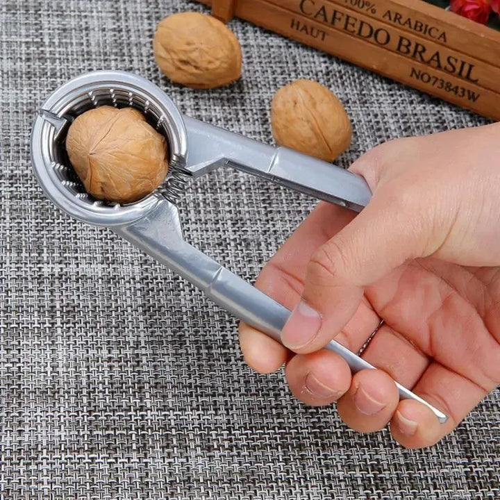 Nutoro Casse-noix en métal | Multifonctionnel pour noix, châtaignes, amandes et noisettes | Poignée ergonomique | Argent