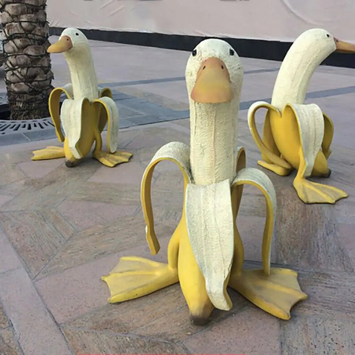 Sculpture BananaDuck "Quaki" | Décoration de jardin amusante | Résine artistique résistante aux intempéries | 17 cm